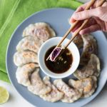 Asian-style cabbage dumplings with a dipping sauce-image