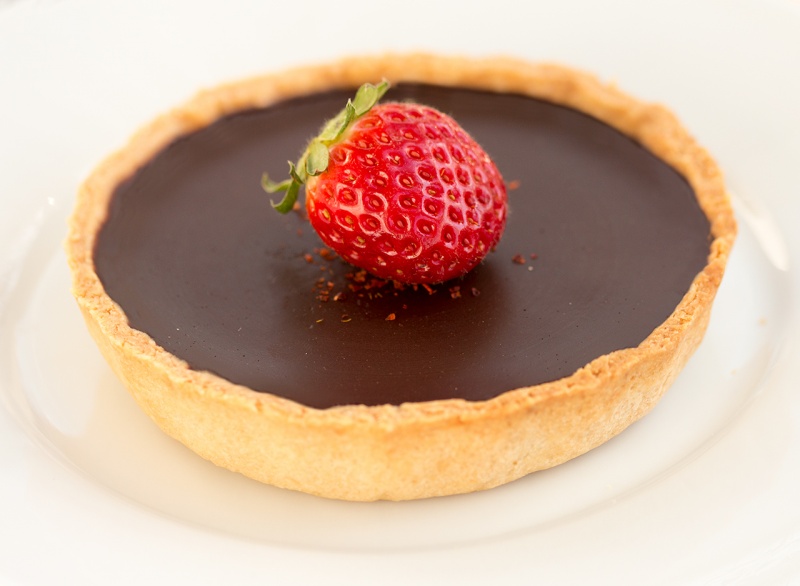 Chilli chocolate tart topped with stawberry