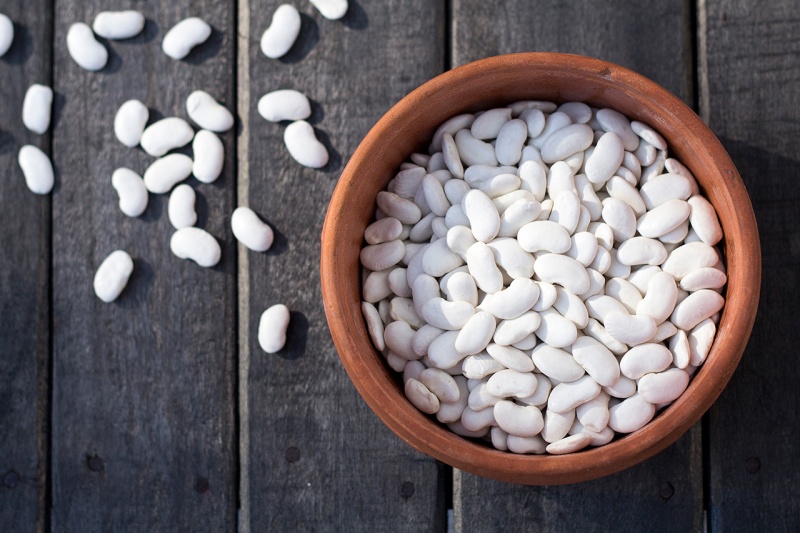white beans in terracota pot