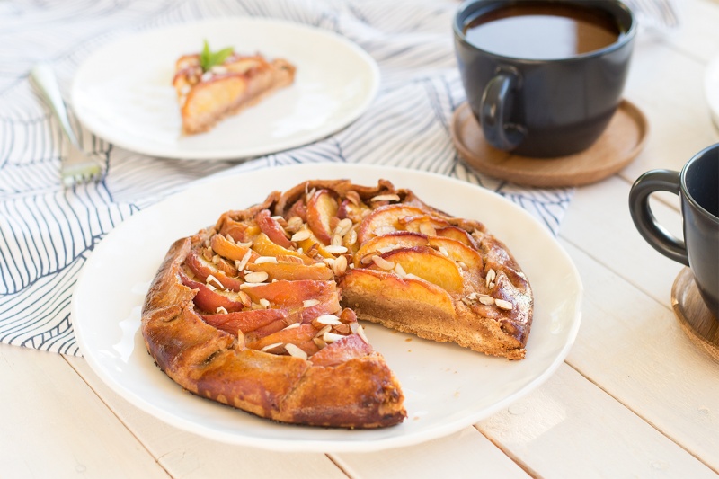 Vegan peach frangipane galette with coffee