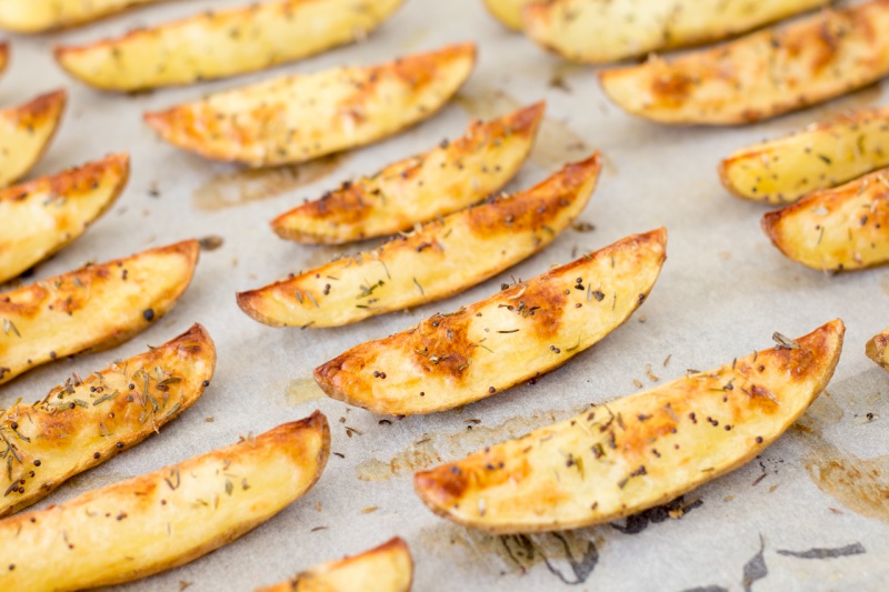 potato wedges on baking tray