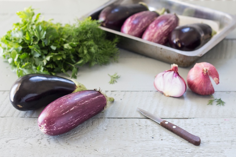 preparing vegetarian stuffed aubergines