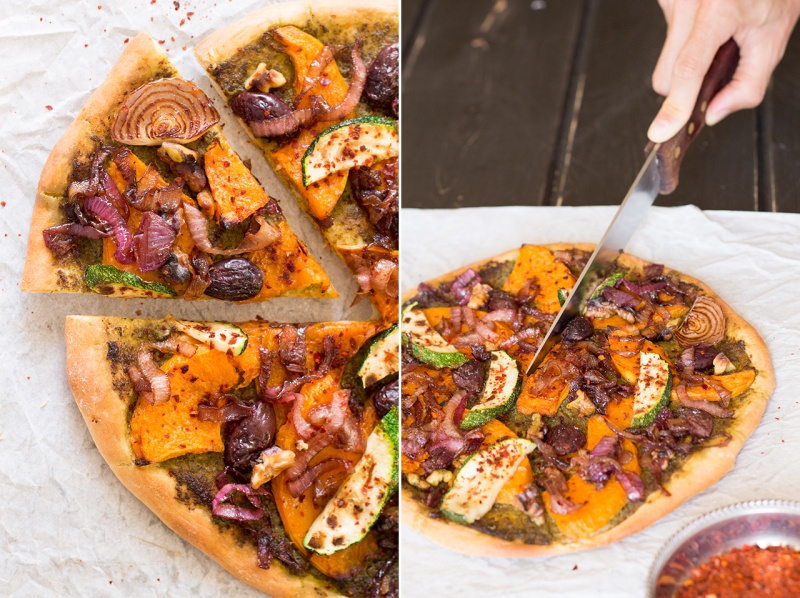 fall pizza with pumpkin being cut