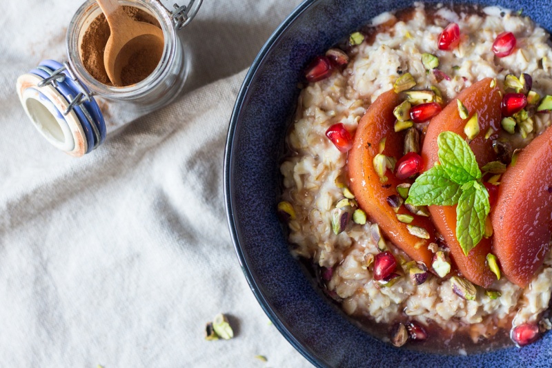 autumn porridge with poached quince close up