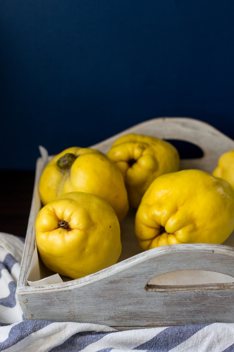 fresh quince on a tray