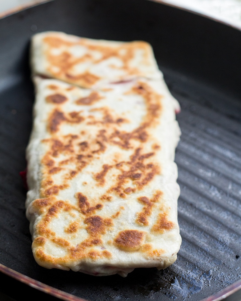 beetroot horseradish gozleme on a pan