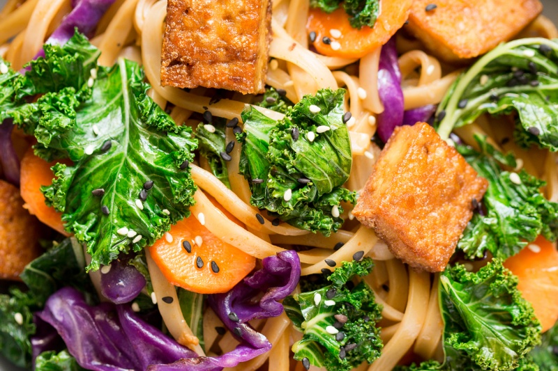 miso maple noodles with kale and tofu close up