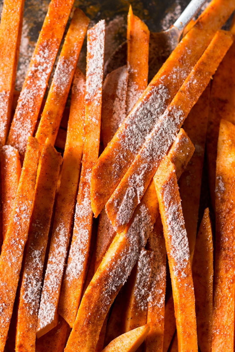 crispy sweet potato fries sprinkled with cornflour and spices