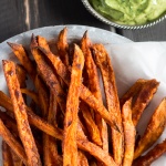 Crispy sweet potato fries with avocado-coriander dip-image