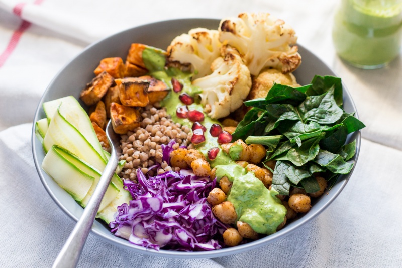 winter goodness bowl with a green super sauce