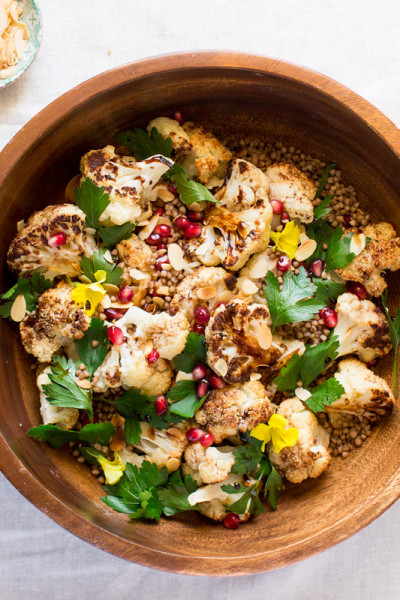 a bowl of roast cauliflower salad with balsamic maple reduction