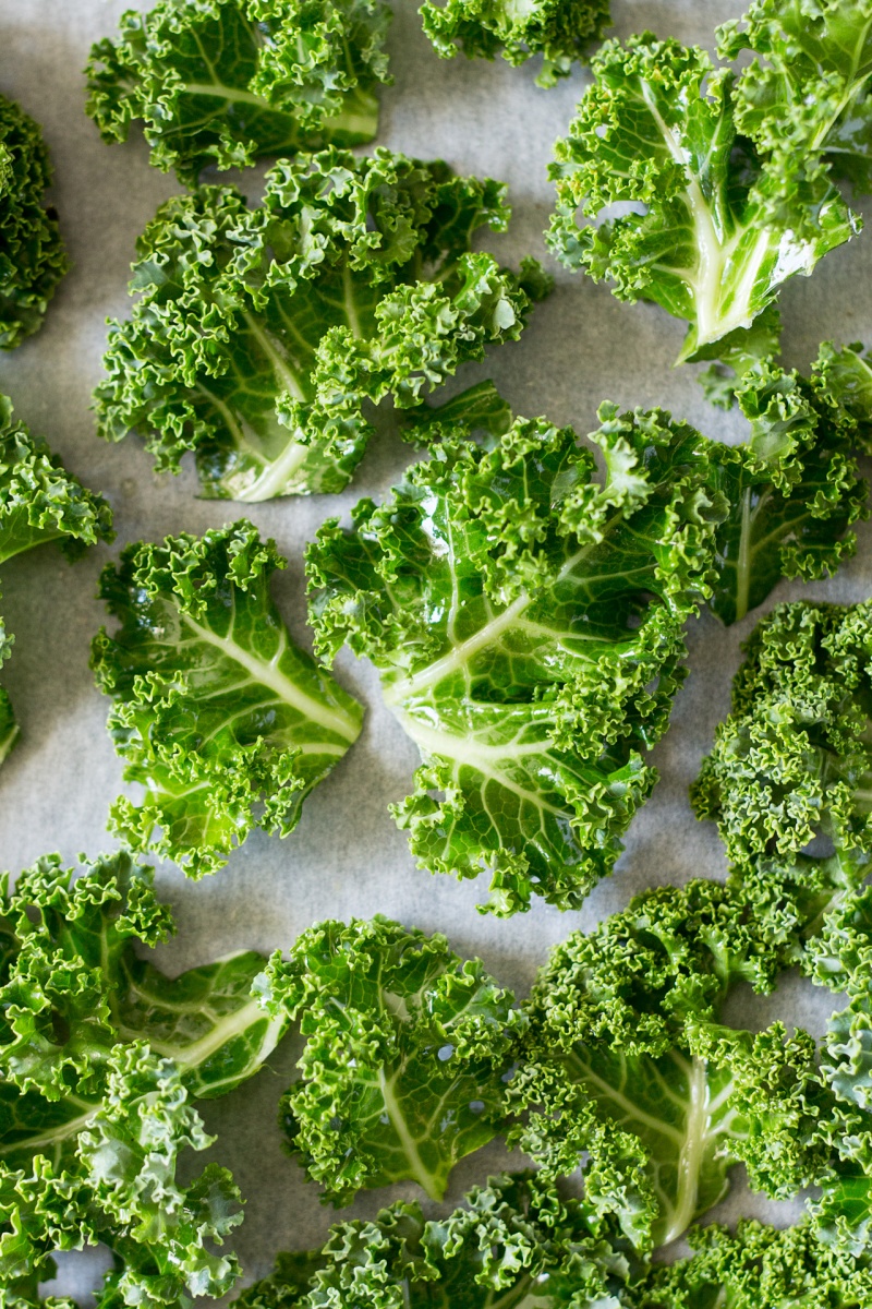 vegan kale chips on a baking tray