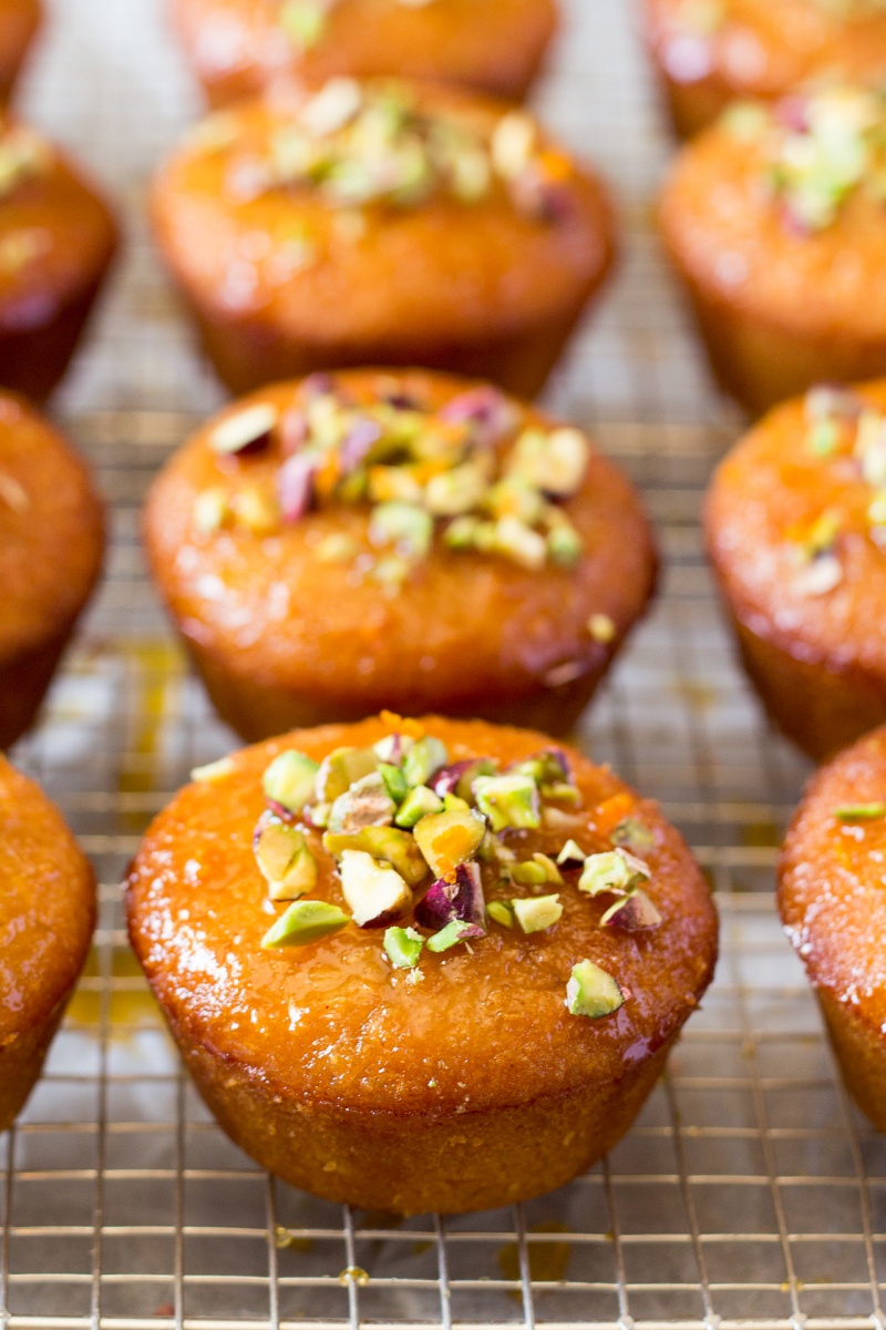 orange semolina cupcakes on a rack