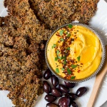 Quinoa cumin crackers with carrot hummus-image