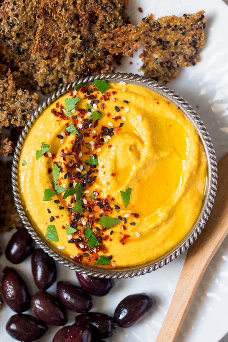 carrot hummus and quinoa cumin close up 