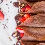 Vegan chocolate crêpes with hazelnut filling and strawberries-image