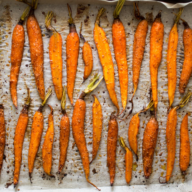 young carrots roasted in spices and maple syrup