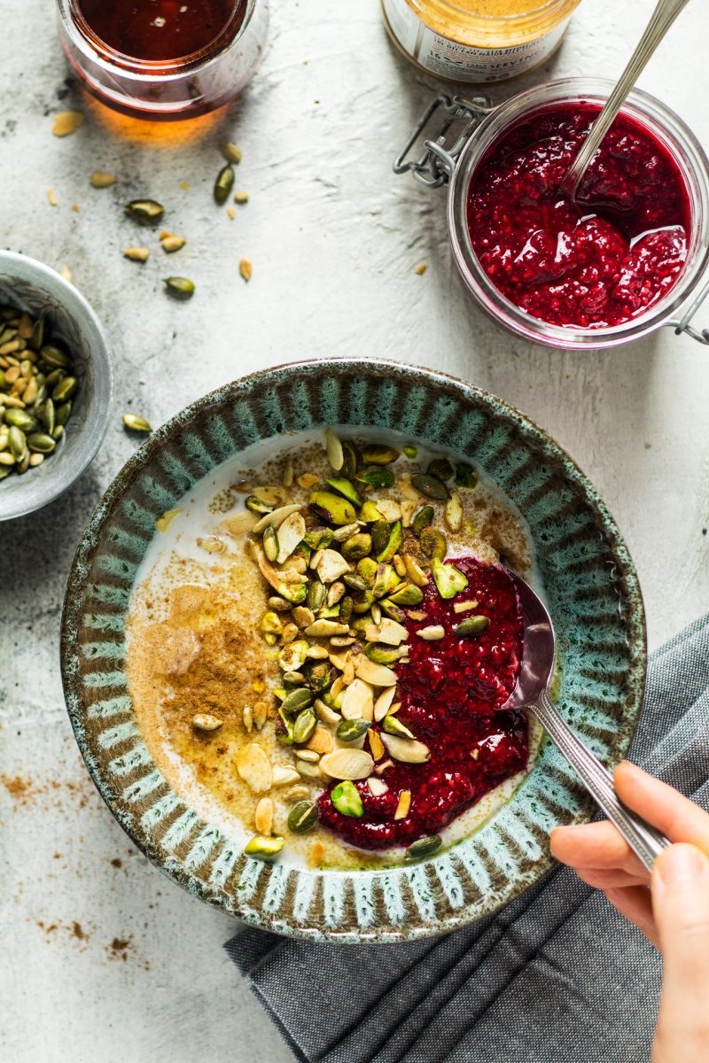 amaranth porridge raspberry chia jam portion