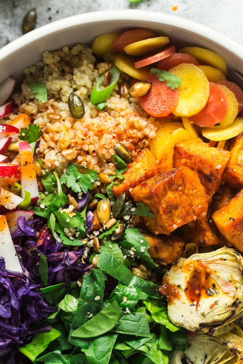 sunny veggie bowl harissa dressing close up