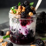 Granola pots with blackberries-image