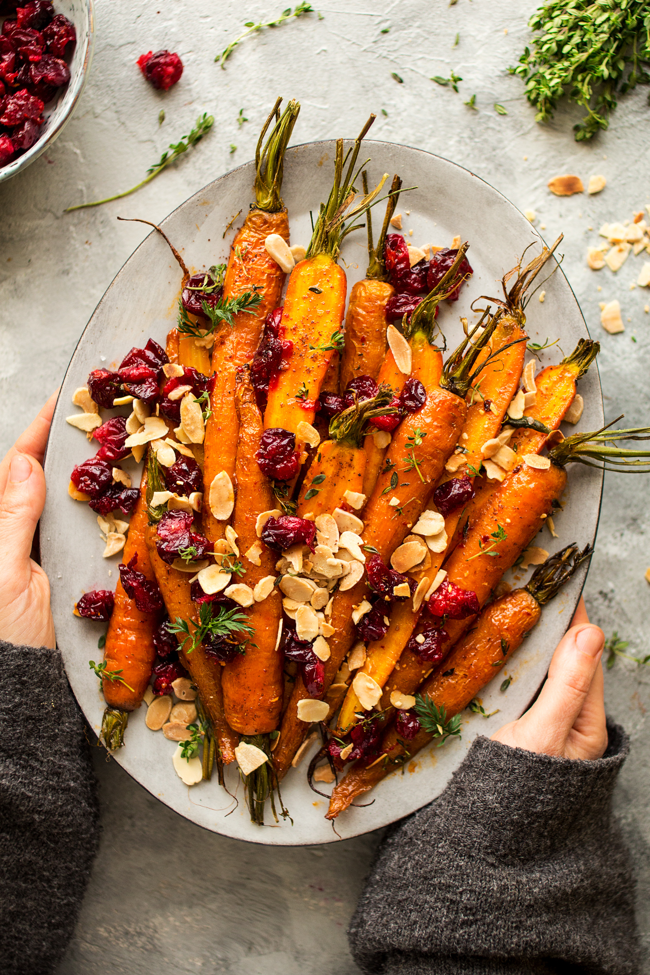 maple roasted carrots platter held