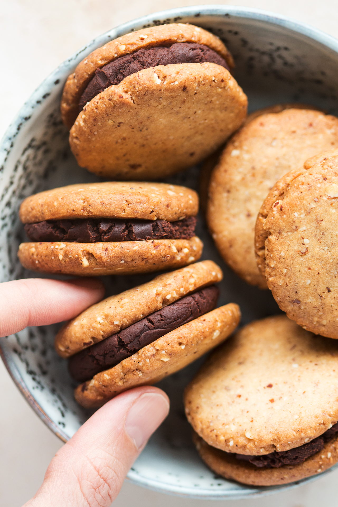 vegan cookie sandwiches hand