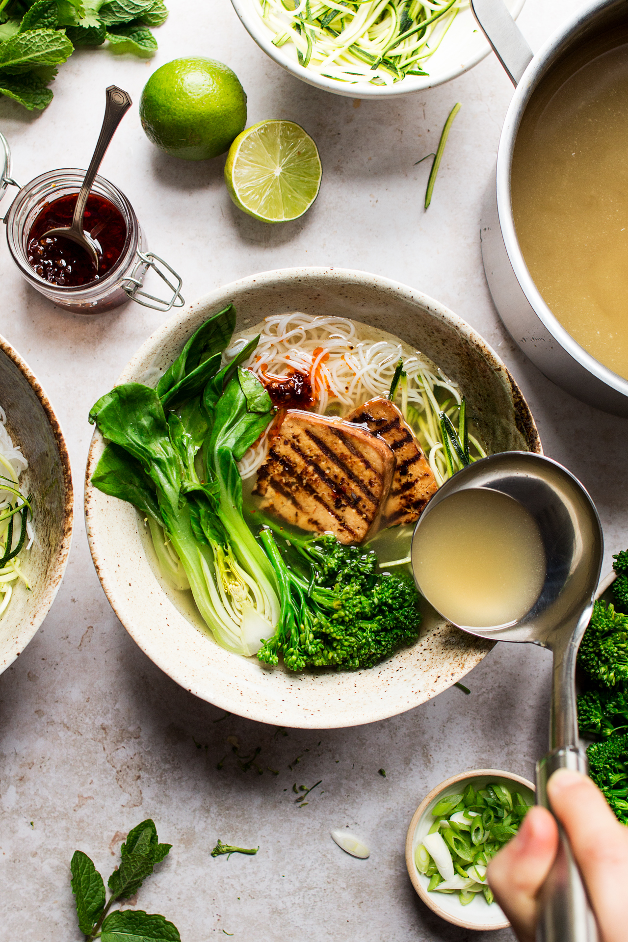 vegan lemongrass soup pouring