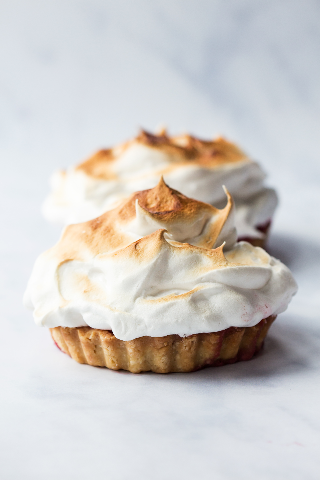 vegan meringue  raspberry tarts side view