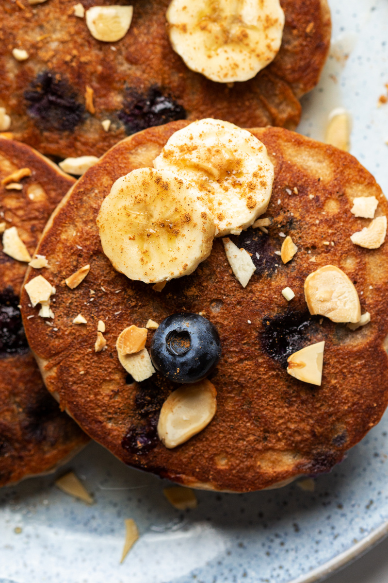 vegan banana blueberry pancakes close