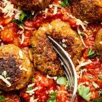 Meaty vegan meatballs in tomato sauce-image