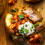 Baked potatoes with smoky beans-image