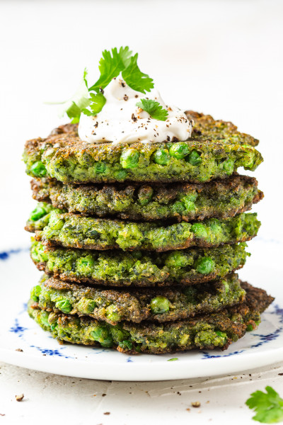 kale green pea fritters stacked