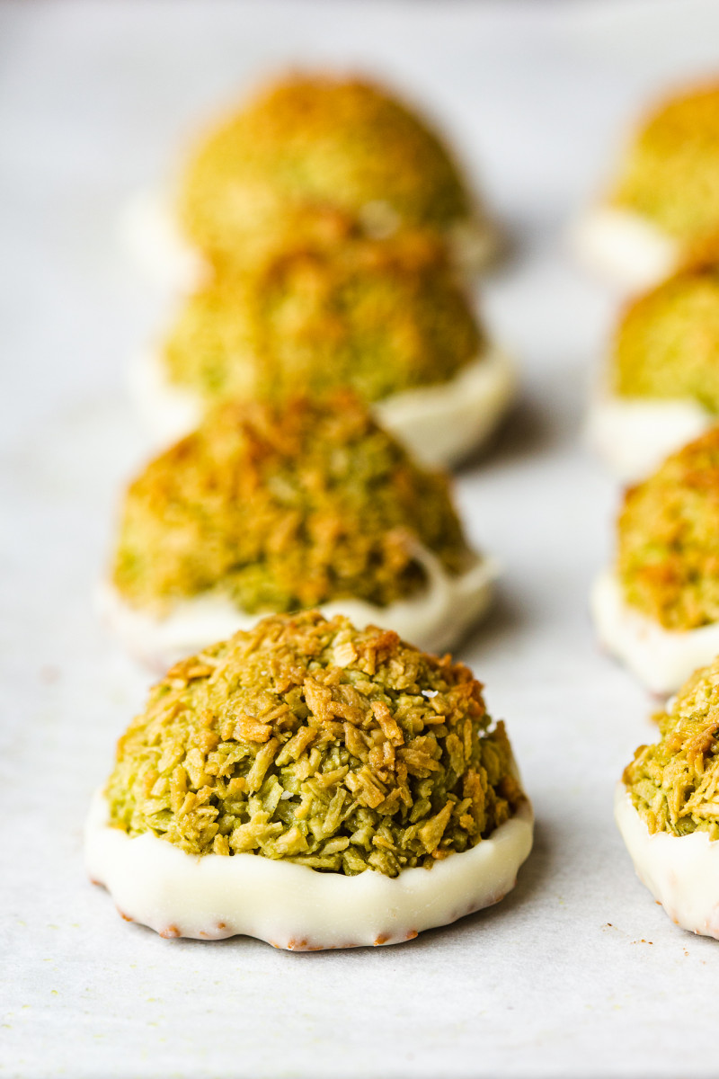 matcha coconut macaroons dipped in chocolate