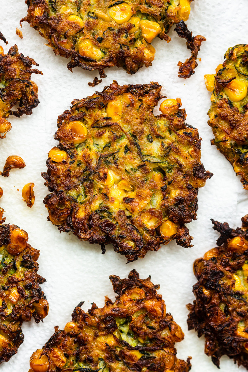 courgette sweetcorn fritters draining