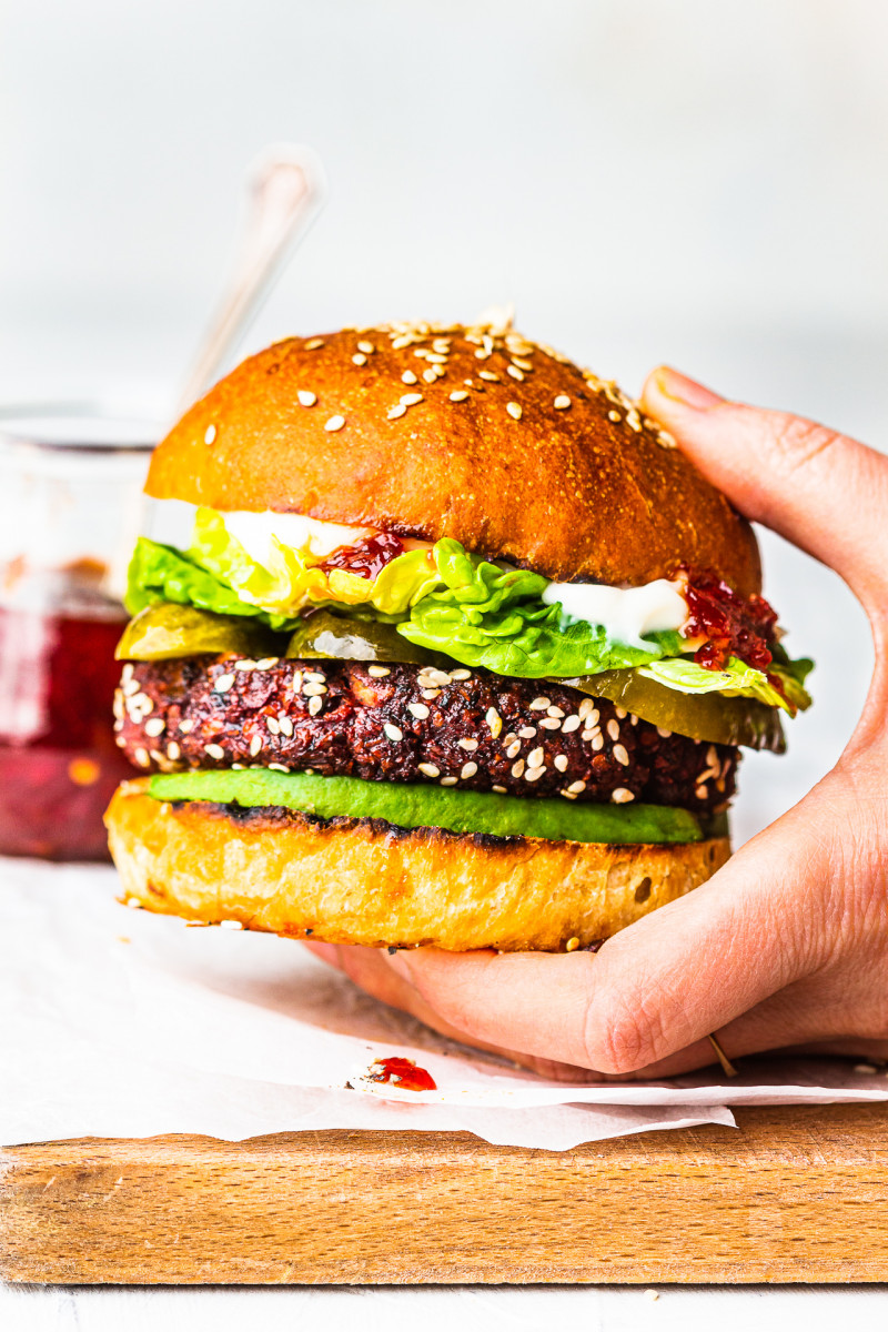 vegan beet burgers in hand