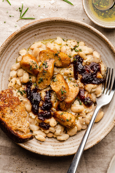 white kidney beans rosemary oil plate