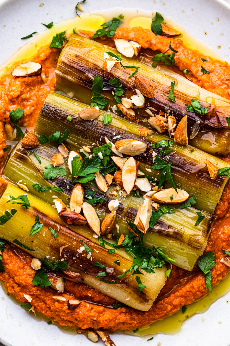 romesco sauce braised leeks closeup